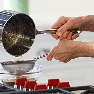 straining brown butter